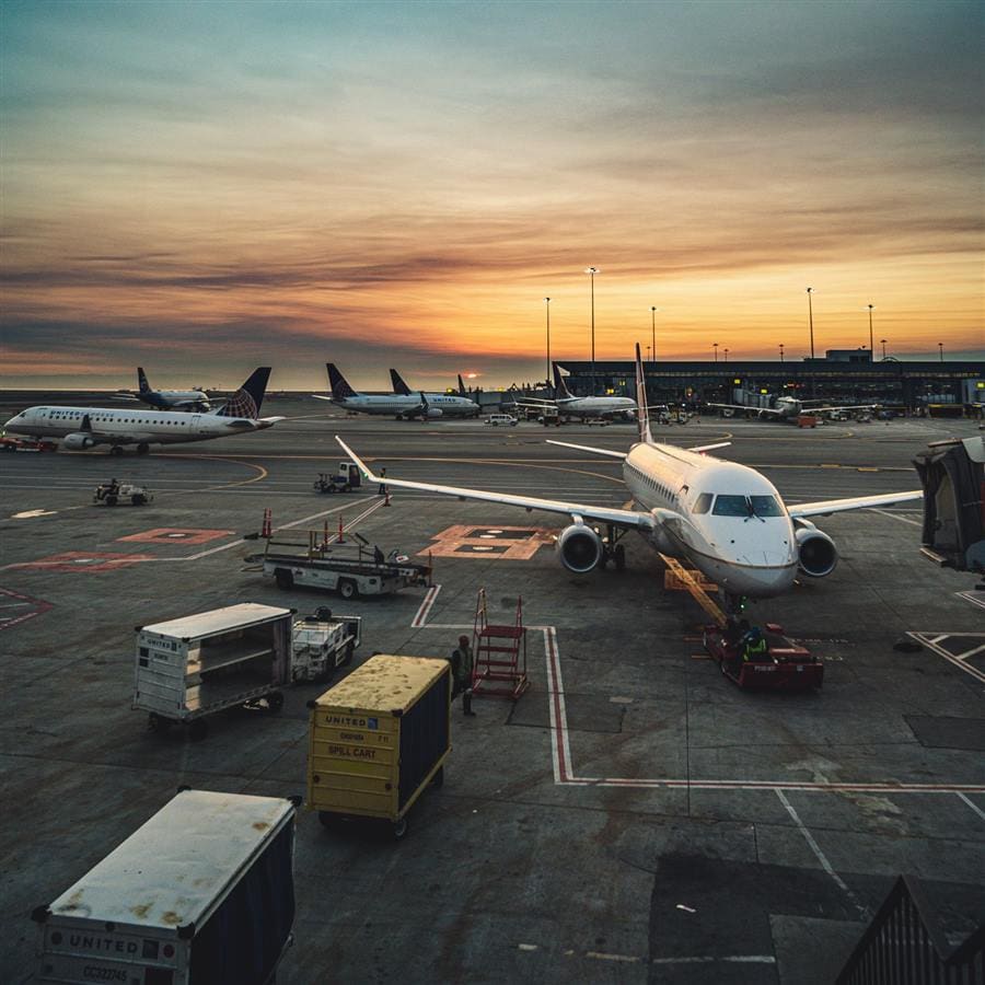 Aircraft on the tarmac at sunset