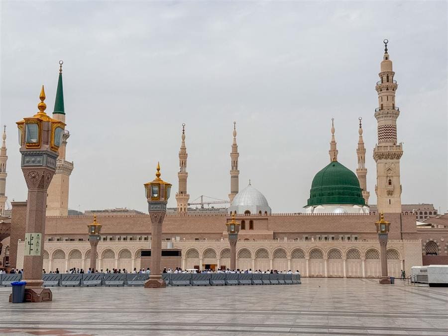 The courtyard of Masjid an-Nabawi with its ornate lamp posts, Madinah