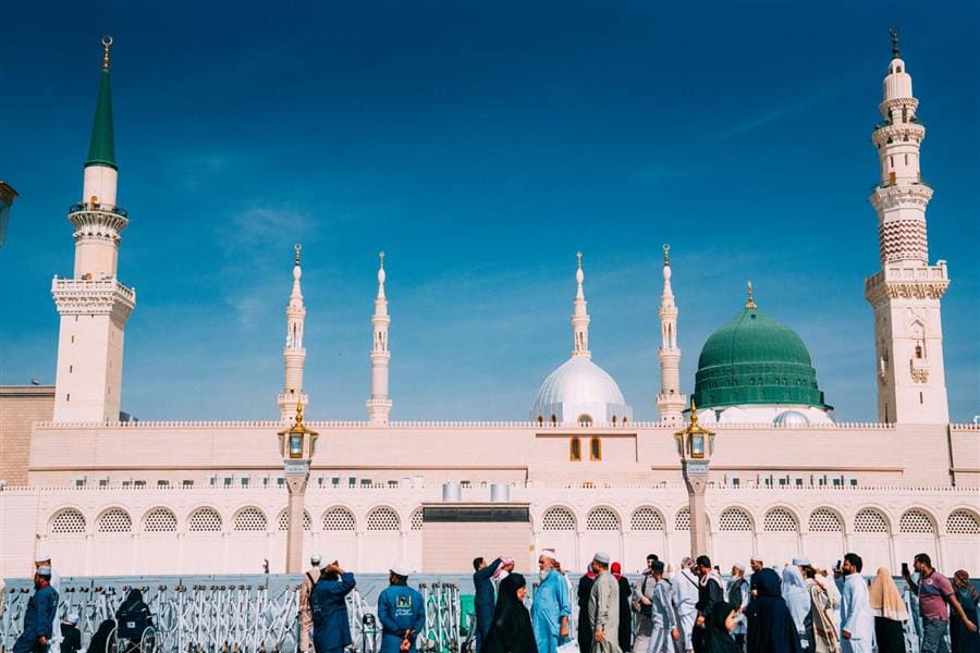 Masjid an-Nabawi exterior with pilgrims, Madinah